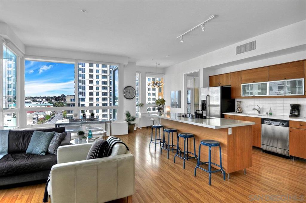 Beautiful contemporary 2 bed/2 bath eighth floor condo with a corner location that provides panoramic views of the cityscape, harbor, and beyond! Fully furnished with gorgeous en-suites, accenting the modern finishes that leave nothing to be desired. 2 assigned parking spots are included with this beautiful condo, conveniently located a few blocks away from Waterfront Park and all the Little Italy restaurants—90-day minimum stay required by HOA, no exceptions.