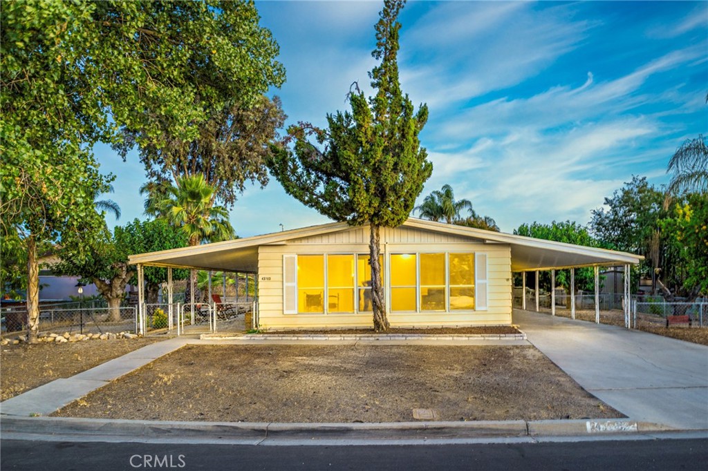 Check out this nicely updated home located in the Valle Vista area of Hemet! Owned by the same family for many years, this 1440 sq. ft. home features a spacious floor plan and sits on a large lot located on a quiet cul-de-sac. The owners have recently repainted the interior and kitchen cabinets and have completed recent working on the exterior landscaping. The kitchen and both bathrooms have been tastefully updated so everything is ready for you to just move in! The front formal living area has been converted into a massive 3rd bedroom with private entrance so it could be a possible rental room for additional income, or you can convert it back to a formal living room. The family room and kitchen have large windows which bring in copious amounts of natural lighting creating a bright and open atmosphere. The master bedroom is huge with a big private bathroom and the second bedroom is large as well. This home is a great value in a desirable part of Hemet so make sure you don't miss out on this fantastic opportunity.