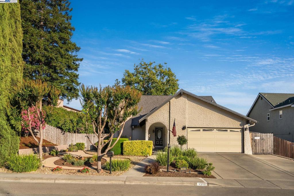 Offered for the first time in 25 years, 3366 Ensenada Drive is a rare gem in the desirable Rancho Ramon neighborhood, showcasing picturesque hillside views from the front yard. This lovingly maintained home features a flexible layout with four bedrooms, three full baths, and dual primary suites—one on each level—ideal for multi-generational living or hosting extended guests. The upstairs suite adjoins a spacious flex room, perfect for a fifth bedroom, home office, or media lounge. Inside, vaulted ceilings and abundant natural light lead you to the back of the home, where the kitchen and family room flow together in a warm, open-concept space. Updated about five years ago, the kitchen offers a sprawling Corian island, ample cabinetry, and views of the beautifully landscaped backyard. Outdoors, enjoy lush landscaping, fruit trees, and a built-in BBQ island with grill, mini fridge, and integrated stereo system. Additional highlights include a newer roof, owned solar, dual-pane windows, and a finished garage with epoxy floors and premium built-ins. All just minutes from top-rated schools, Bishop Ranch, The LOT, and the Iron Horse Trail.