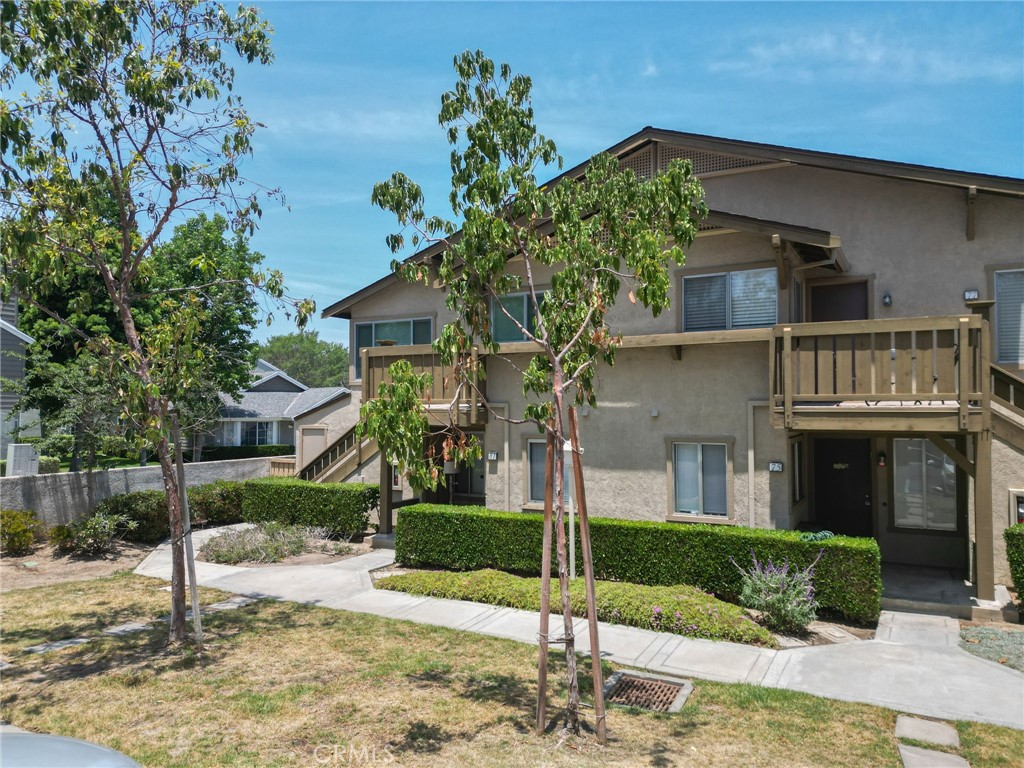 Welcome to this beautifully refreshed ground-floor end unit in the heart of Irvine’s highly desirable Woodbridge community—a neighborhood celebrated for its tree-lined greenbelts, sparkling lakes, and resort-style amenities.From the moment you step inside, you’ll feel right at home. The light-filled interior has been thoughtfully upgraded with fresh designer paint, brand-new flooring in the bedroom, hallway, and laundry area, and a modernized bathroom featuring a sleek new vanity and toilet. The open-concept layout seamlessly connects the living, dining, and kitchen spaces, where expansive windows invite in natural light and create a warm, airy atmosphere.Step through sliding doors to your own spacious private patio—perfect for morning coffee, weekend barbecues, or simply unwinding at the end of the day. Practical touches like a full-size laundry closet and a bonus storage area make daily living effortless.Tucked into a tranquil setting, this home also offers immediate access to all that Woodbridge has to offer: sparkling lakes with sandy lagoons, multiple pools, tennis and pickleball courts, basketball courts, playgrounds, lush parks, and scenic walking paths. Plus, you’ll enjoy close proximity to top-rated schools, shopping, dining, and easy access to major freeways—just minutes from John Wayne Airport, Laguna Beach, the Irvine Spectrum, and UCI.Don’t miss this rare opportunity to own a move-in-ready home in one of Irvine’s most beloved and vibrant communities.