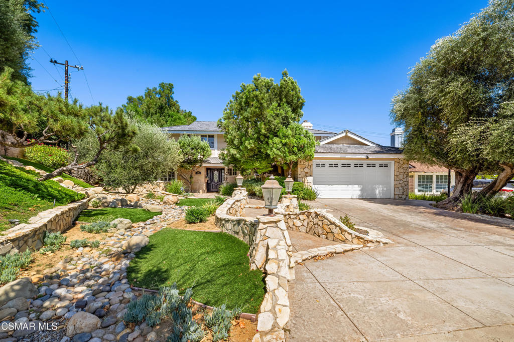 Welcome to 3560 Monticello Avenue -- an entertainer's dream in the highly sought-after Nob Hill tract of Simi Valley. This beautifully crafted two-story home offers over 2,400 square feet of versatile living space on a generous 13,500+ sq. ft. lot. Designed with both comfort and functionality in mind, the home features 4 spacious bedrooms, 3 full bathrooms, and a large multi-use flex space on the main level -- ideal for a 5th bedroom, home office, gym, or creative studio. The possibilities are endless. Step inside to discover a warm and inviting living room with a cozy fireplace, a formal dining area, and a spacious family room enhanced by a custom coffered ceiling and built-in bar, all overlooking the lush backyard. The open-concept kitchen is a chef's paradise, complete with rich wood flooring, granite countertops, custom cabinetry, high-end stainless steel appliances, a KitchenAid built-in refrigerator, Viking range, and a convenient pot filler. Retreat upstairs to the relaxing primary suite featuring dual closets and an en suite bathroom with double vanities. All secondary bedrooms offer ample space and generous closets. Whether you're hosting lively gatherings or enjoying quiet evenings, the backyard is your personal oasis. Enjoy a sparkling pool, outdoor fireplace, built-in BBQ center, covered patio for year-round entertaining, and a large gated side yard with a storage shed. Additional highlights include central air and heat, a direct-access two-car garage, and fully owned, energy-efficient solar panels that help keep utility costs down. This rare gem offers a perfect blend of luxury, comfort, and value -- don't miss your chance to call it home!