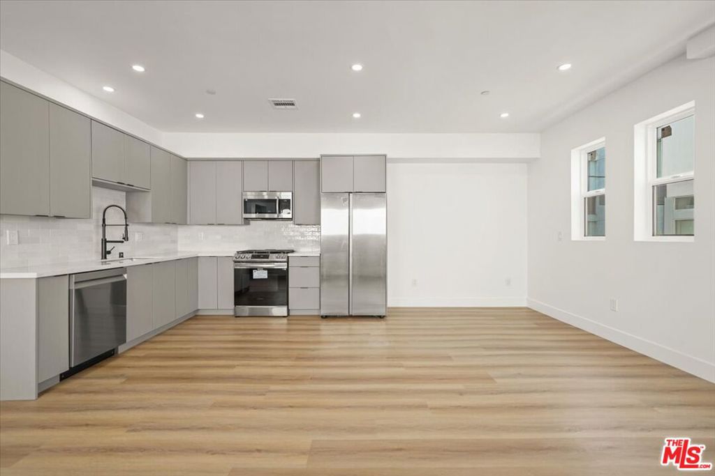 ** 1 MONTH FREE PROMOTION - SEE FULL DESCRIPTION BELOW ** PET FRIENDLY ** WASHER/DRYER ** CENTRAL A/C ** MODERN CONSTRUCTION ** 2 ASSIGNED PARKING SPACES ** BALCONIES ** Now leasing these beautiful Hudson Townhome style apartments, experience elevated living in this brand-new, modern residence tucked away in the heart of Hollywood's coveted Media District. This gated boutique property offers a perfect blend of style, comfort, and convenience. Step inside your beautifully designed unit featuring an in-unit washer and dryer, central AC, stainless steel appliances, quartz countertops, and private balconies that let in tons of natural light. Each unit comes with assigned parking and access to a secure, gated entry for added privacy. Located just minutes from iconic spots like Paramount Studios, Netflix HQ, and Sunset Gower Studios, you're in the middle of it all yet nestled on a quiet, tree-lined street. Enjoy weekend strolls through Larchmont Village, dine at trendy cafes on Melrose, or shop at local farmers' markets. You're also close to Runyon Canyon, Hollywood Forever, and quick freeway access to the rest of LA. Whether you're a creative professional or just looking for stylish, connected city living, this location offers the best of both worlds. Pet-friendly, brand new, and move-in ready. Schedule a tour today and make this your next home! *pictures may vary of similar units ** 1 MONTH FREE ON A 13 MONTH LEASE PROMOTION - PRICE SHOWN WITH AVAILABLE 13 MONTH SPREAD - BASE RENT $5,495 **