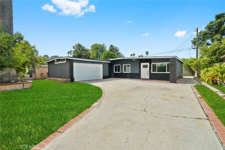 Welcome to your stunning 4-bedroom, 2-bathroom home, completely remodeled with modern finishes and thoughtful upgrades throughout. Step inside to an open, light-filled layout featuring fresh interior and exterior paint, brand-new flooring, and all-new dual-pane windows that fill the home with natural light.



The stylish brand-new kitchen offers sleek cabinetry, quartz countertops, a new dishwasher, and a new range hood, while both bathrooms have been beautifully updated with modern fixtures and finishes. You’ll also love the spacious private laundry room and extra hallway closet space for added storage and functionality.



The primary bedroom includes a bonus living room area—perfect for a private retreat, home office, or lounge space—and provides direct access to the laundry room for added convenience.



Major system upgrades include new copper plumbing, new ABS drain lines, new electrical wiring for all lighting and ceilings, a brand-new electrical panel, and a new torch-down rolled roof with new metal flashing for lasting durability and peace of mind.



Outside, enjoy a two-car garage with ADU potential, a long driveway with ample parking, and spacious front and backyard areas ideal for entertaining, gardening, or future expansion.



This beautiful home combines comfort and modern design—perfect for first-time buyers or growing families looking for a turnkey property with exceptional value.