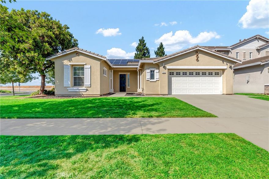 Step inside and feel the warmth of this inviting single-story home in North Merced. Desired split floor plan where every detail has been designed for both comfort and style. An open-concept floor plan creates the perfect flow between living, dining, and entertaining. The living room welcomes you with a cozy fireplace and abundant natural light, while the kitchen complete with a large center island and quartz countertops is ready for your favorite meals and gatherings. The private primary suite offers a relaxing retreat with a soaking tub, separate shower, and dual sinks. Outside, the backyard patio is ideal for weekend BBQs, morning coffee, or simply unwinding at sunset. Upgrades tie it all together, including owned solar, new HVAC unit, fresh interior paint, new quartz countertops and backsplash, new light and plumbing fixtures, Moen Flo smart water shutoff system, new blinds, hardware, and baseboards. This move-in ready home blends efficiency, style, and everyday livability truly a place to call home.