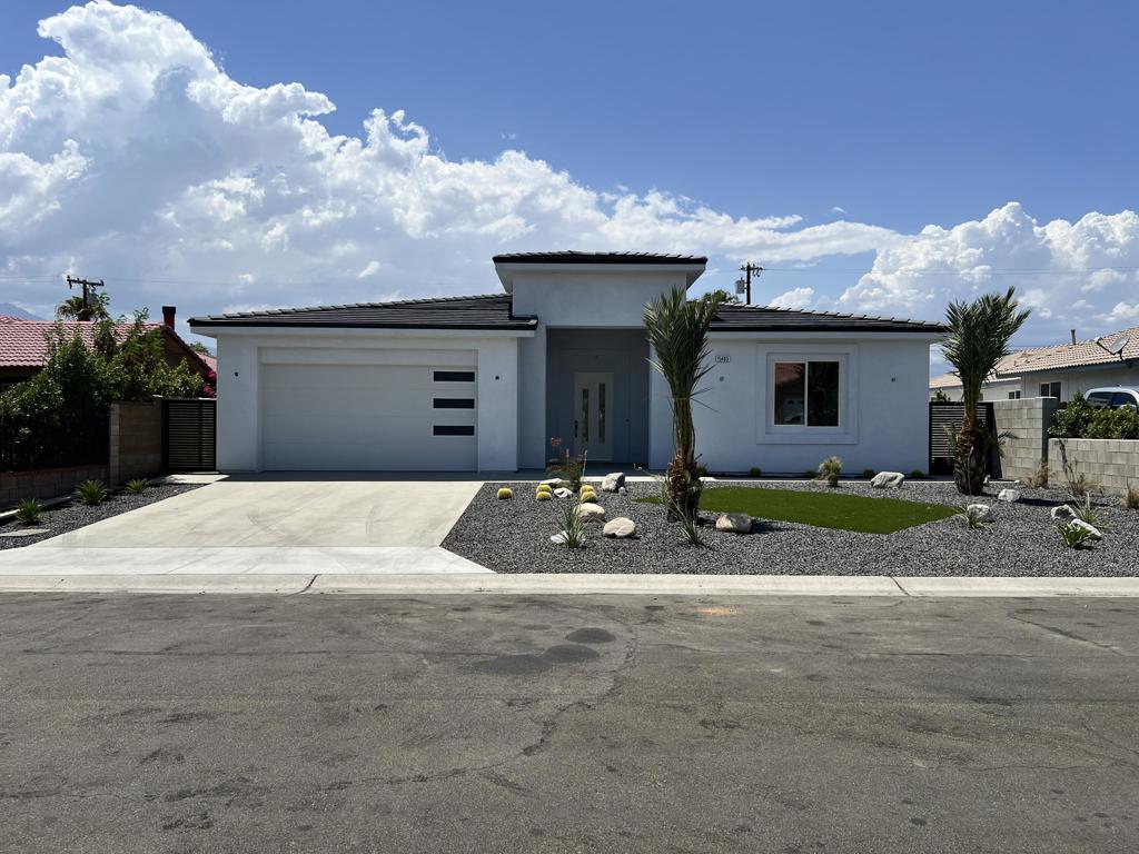 Newly built and ready to move in, this new build offers 2,300 sq ft of clean, modern design. The single-level layout features an all-white interior, high ceilings, and large-format tile flooring throughout. The open living space connects seamlessly to a contemporary kitchen, ideal for both daily living and entertaining. Three well-sized bedrooms and two bathrooms are designed for comfort and function, with thoughtful finishes and abundant natural light. Set on a quiet street with mountain views, this home is minutes from local hot springs, shopping, dining, and a short drive to Palm Springs. A straightforward opportunity to own a modern home in a growing desert community.
