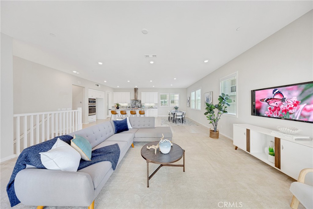 Welcome to 104 Sculpture, a beautifully appointed residence nestled in the prestigious Cadence Park neighborhood of Irvine’s Great Park. This exceptional 3-bedroom, 2.5-bathroom with a huge bonus room condo offers an elevated lifestyle with contemporary design, and a highly sought-after location—just steps from world-class amenities and award-winning Irvine schools.
Positioned on a desirable corner lot, this home enjoys abundant natural light on all sides, enhanced by fully detached walls on the upper floors—creating a rare sense of privacy and the spaciousness of a single-family home.
Step inside and experience luxury living across 2,892 square feet, featuring:
· A bright open-concept second floor perfect for entertaining.
· A gourmet chef’s kitchen with high-end stainless steel appliances, pristine white cabinetry, an expansive center island, and a walk-in pantry
· A generously sized living and dining area that opens to a breezy balcony retreat—ideal for indoor-outdoor gatherings
· A lavish primary suite with a walk-in closet, dual vanities, a spacious walk-in shower, and designer finishes
· Two well-appointed secondary bedrooms, a full bath, a convenient powder room, and an upstairs laundry room with custom cabinetry
· A top-floor bonus room with a private oversized balcony, offering breathtaking panoramic views—perfect as a home office, gym, media lounge, or creative studio
This home also features a 2-car attached garage on the ground level and is move-in ready with thoughtful upgrades throughout.
Living in Cadence Park means you’re minutes away from parks, playgrounds, pools, clubhouses, walking trails, tennis courts, and top-rated schools including Cadence Park School (K–8) and Portola High School. Enjoy the convenience of nearby shopping, dining, and entertainment at Irvine Spectrum, plus easy access to the I-5 freeway.
