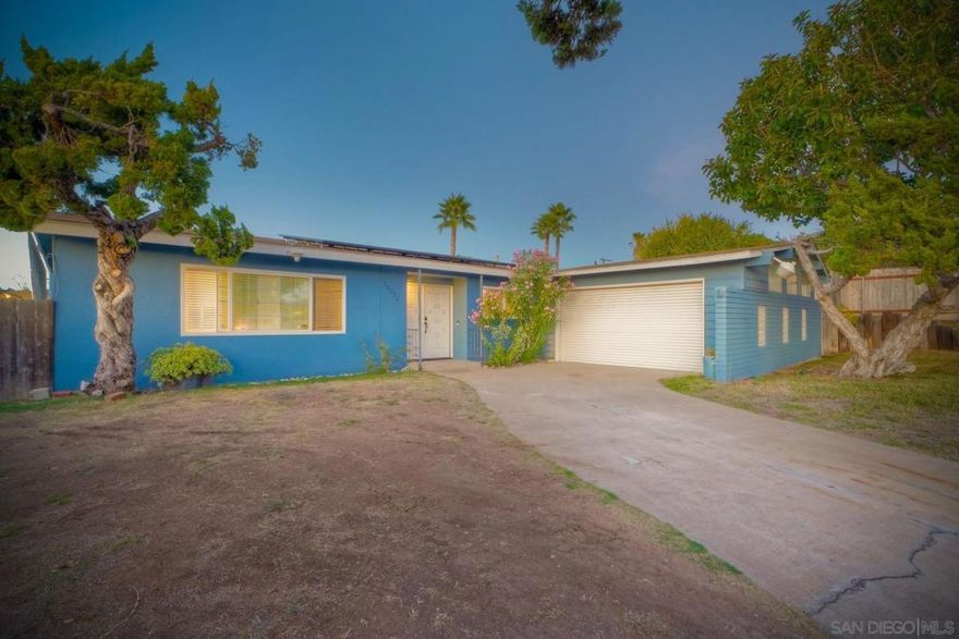 Don't miss this beautifully maintained home perched on the highly sought-after Mt. Helix, offering comfort, efficiency, and style. This property features paid-off solar, an inviting extra 380 sq. ft. sunroom, and an electric fireplace perfect for cozy evenings. The spacious kitchen is ideal for entertaining, complete with a built-in range on the island and all appliances included, plus washer and dryer for added convenience. Step outside to enjoy the outdoor barbecue area, great for gatherings and enjoying San Diego’s year-round sunshine. The two-car garage provides ample storage and parking. VA buyers—don’t miss the opportunity for a possible assumable 2.25% VA rate, making this home an even greater value!!