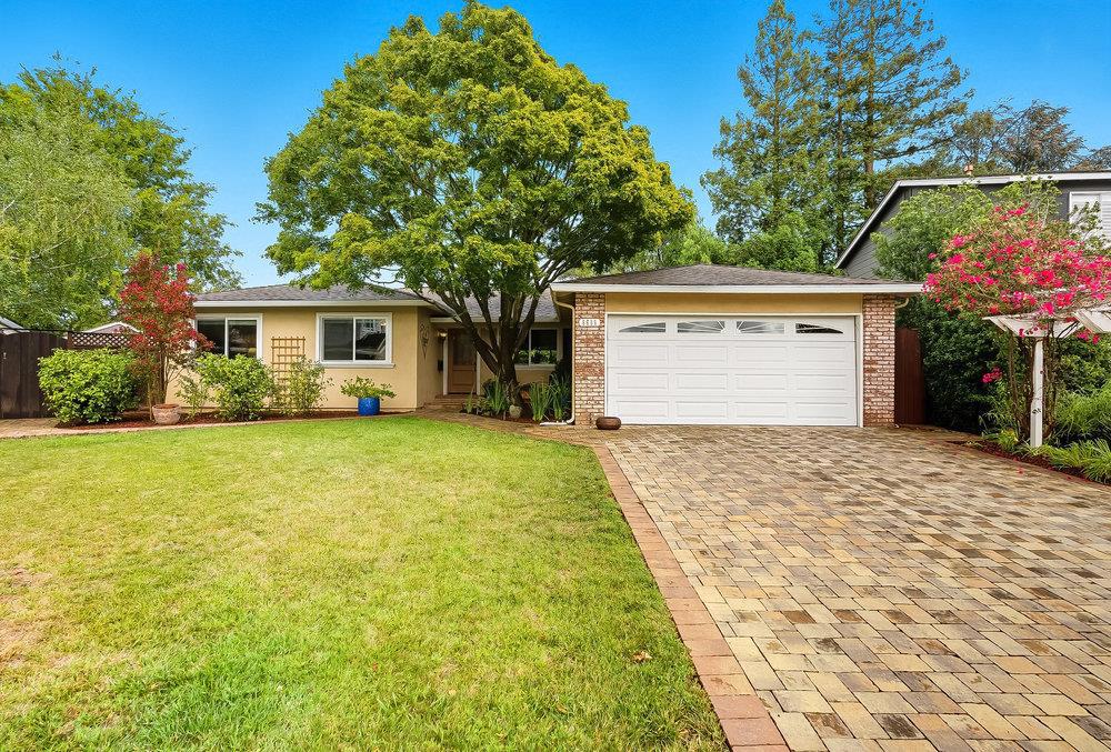 For the first time in over 50 years, this cherished Almaden Valley home is ready for its next chapter. Nestled on an expansive 11,163 (+/-) square foot lot, this 3-bedroom, 2-bath single-story blends comfort, character, and convenience in one of the communitys most sought-after settings. Step inside to soaring cathedral ceilings and sun-filled living spaces, where gleaming engineered hardwood floors lead you through a warm and inviting floor plan. The remodeled kitchen is the heart of the home, complete with granite counters, custom cabinetry, natural stone flooring, stainless steel appliances, and a generous island perfect for family gatherings or casual mornings with coffee. Both bathrooms are beautifully updated with timeless finishes. Outside, a backyard oasis awaits -- mature trees, lush landscaping, and a flagstone patio create a peaceful retreat with endless potential for entertaining or future expansion. Thoughtful upgrades include fully owned solar, newer HVAC, recessed lighting, and dual-pane windows. With Greystone Park and Los Alamitos Creek Trail just steps away, and award-winning schools: Graystone Elementary, Bret Harte Middle, and Leland High Schools within walking distance, this home offers the perfect balance of lifestyle, location, and legacy.