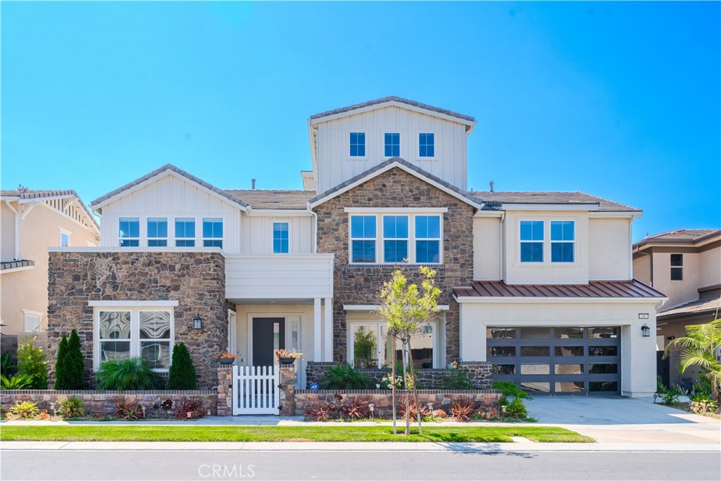 Stunning Modern Home in the Prestigious Gated Community of Altair, Irvine
Welcome to this extraordinary three-story contemporary residence located in the luxurious 24-hour guard-gated Altair community of Irvine. This never-before-occupied home offers the perfect blend of sleek modern design, functional living spaces, and resort-style amenities — all in one of Irvine’s most sought-after neighborhoods.
* Key Features:
* Three Levels of Modern Living
• A spacious, open-concept first floor welcomes you with an elegant living area seamlessly connected to the kitchen and dining space.
• Gleaming floor tiles run throughout the main living area, enhancing both style and durability.
* Gourmet Kitchen
• Outfitted with pristine white cabinetry, a generous center island, and top-of-the-line stainless steel appliances.
• The adjacent sunlit dining area is lined with windows that flood the space with natural light.
* Indoor-Outdoor Flow
• A large sliding glass door connects the living and dining area to the beautifully landscaped backyard, complete with a cozy outdoor fireplace, seating area, and lawn — perfect for relaxing or entertaining.
* Dedicated Office Space
• A private home office on the first floor offers a peaceful environment for working remotely.
• Also on the main level is a convenient en-suite guest bedroom, ideal for visiting family or long-term guests.
* Second Floor Retreat
• The luxurious primary suite features a spacious walk-in closet and a spa-inspired bathroom with high-end finishes.
• Three additional bedrooms are also located on the second level, each offering ample space and comfort.
* Third Floor Loft
• A versatile third-floor loft serves perfectly as a secondary living room, media room, game room, or private retreat with panoramic community views.
* Location & Lifestyle
• Situated minutes from the Great Park, award-winning schools, world-class shopping and dining, and major freeways.
• Residents of Altair enjoy access to resort-style amenities, including pools, clubhouses, parks, playgrounds, walking trails, and more.
* Don’t miss this rare opportunity to own a like-new modern luxury home in one of Irvine’s most exclusive communities. Move-in ready and built to impress!