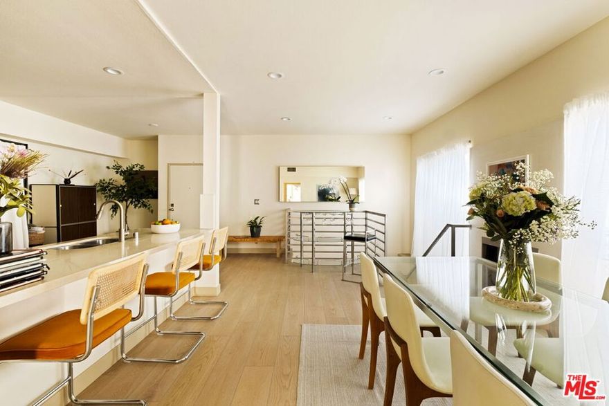 This spacious, move-in ready 4-bedroom, 4-bath townhouse-style condo offers nearly 1,840 square feet of thoughtfully designed living space in a quiet, centrally located Westwood neighborhood. The flexible two-level layout includes two bedrooms upstairs and two down, ideal for privacy, guests, or working from home. The upper level features a bright dining area with large windows and a gas fireplace, along with an updated kitchen finished with Caesarstone countertops, generous cabinetry, and stainless steel appliances. Two bedrooms are located on this level, one with an en-suite bath, and both open to private balconies through sliding glass doors. Downstairs, the main living room provides a comfortable space to relax or entertain. Two additional bedrooms, including another en-suite, open directly to a private rear patio, creating great indoor-outdoor flow and a sense of retreat. The home also features engineered flooring throughout, high-efficiency LED lighting, in-unit laundry, dual-zone central HVAC, four fireplaces, secure entry, and two-car tandem garage parking. Ideally situated near UCLA, Westwood Village, Century City, and the Expo Line, this is a rare opportunity to own a true 4-bed, 4-bath home in Westwood.