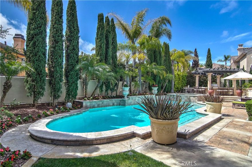 Welcome to this spectacular property at 21 Asilomar. Sellers are willing to paint the inside of the property if tenant would like! One of the finest semi-custom homes in the exclusive, guard-gated neighborhood of Ocean Ranch. Offering the charm of a Mediterranean villa combined with the finest in upscale, modern amenities. This immaculate home showcases designer touches throughout including custom floors with limestone and ash wood. Highest quality woodwork details the home with custom crown mouldings, beautiful archways, and several built-ins. As you enter through the double entry wood doors, a formal entryway greets you and will draw you in to view the library, formal living room and dining room. The downstairs also offers a den with full bath, a living room off of a gorgeous kitchen which is appointed with high-end, stainless steel appliances, granite countertops, large island cooktop, and walk-in pantry. Large windows and patio doors invite you outside to experience the resort-style backyard. The saltwater pool, spa, outdoor kitchen and BBQ, fire pit and formal bar area are magnificent. You'll be sure to enjoy the outdoor lifestyle of Southern California year round! Upstairs, the large master suite contains a fireplace, marble tub and shower and cedar walk-in closet. Three additional bedrooms and two bathrooms complete the second floor. Located close to world class beaches and resorts including Monarch Beach and Ritz Carlton. This is coastal living at it's finest!