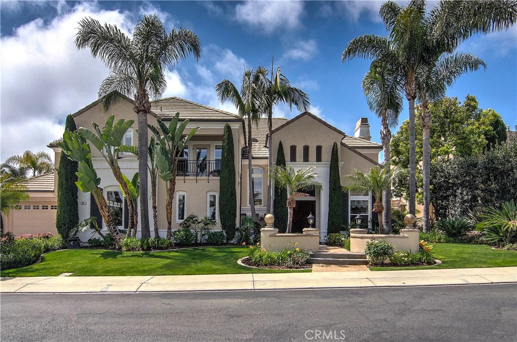 Welcome to this spectacular property at 21 Asilomar! One of the finest semi-custom homes in the exclusive, guard-gated neighborhood of Ocean Ranch. Offering the charm of a Mediterranean villa combined with the finest in upscale, modern amenities. This immaculate home showcases designer touches throughout including custom floors with limestone and ash wood. Highest quality woodwork details the home with custom crown mouldings, beautiful archways, and several built-ins. As you enter through the double entry wood doors, a formal entryway greets you and will draw you in to view the library, formal living room and dining room. The downstairs also offers a den with full bath, a living room off of a gorgeous kitchen which is appointed with high-end, stainless steel appliances, granite countertops, large island cooktop, and walk-in pantry. Large windows and patio doors invite you outside to experience the resort-style backyard. The saltwater pool, spa, outdoor kitchen and BBQ, fire pit and formal bar area are magnificent. You'll be sure to enjoy the outdoor lifestyle of Southern California year round! Upstairs, the large master suite contains a fireplace, marble tub and shower and cedar walk-in closet. Three additional bedrooms and two bathrooms complete the second floor. Located close to world class beaches and resorts including Monarch Beach and Ritz Carlton. This is coastal living at it's finest!