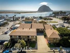 It is all about the Ocean. Bay and Rock view from this best located unit on the end. Great proximity to both downtown and walking to the Embarcadero. This development is total 9 units. 2 bedrooms, 2 bathrooms with amazing Loft with amazing Views. You have a full two car garage with ample storage. This unit has upgraded windows and overall, in very good shape. There is a nice deck of the Master and View Deck off the upstairs loft. On those chilly nights enjoy fireplace. Recent two new garage door openers, water heater. This one has it all- Location, Views and good price.