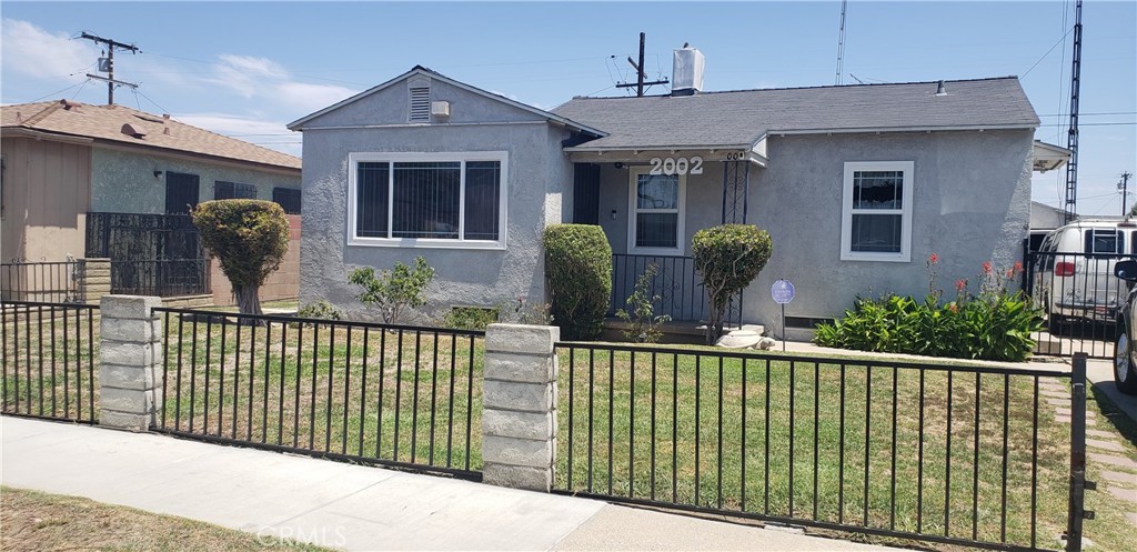 The perfect starter home for the 1st time home buyer or a great move-in ready investment property you'll find here in this thriving area of Los Angeles. An additional bonus room for more storage or use as a small office, and a entry door off the kitchen. One of few homes in this sought after community with a 2 car garage. Entertain in this well kept back-yard while enjoying the jacuzzi, and there's enough space for a large kids swing set or Dad's toys. This property has many walkable amenities, close access to the I-105 and 710 Freeways, shopping and community parks and more. Priced to sell, all offers will be considered.