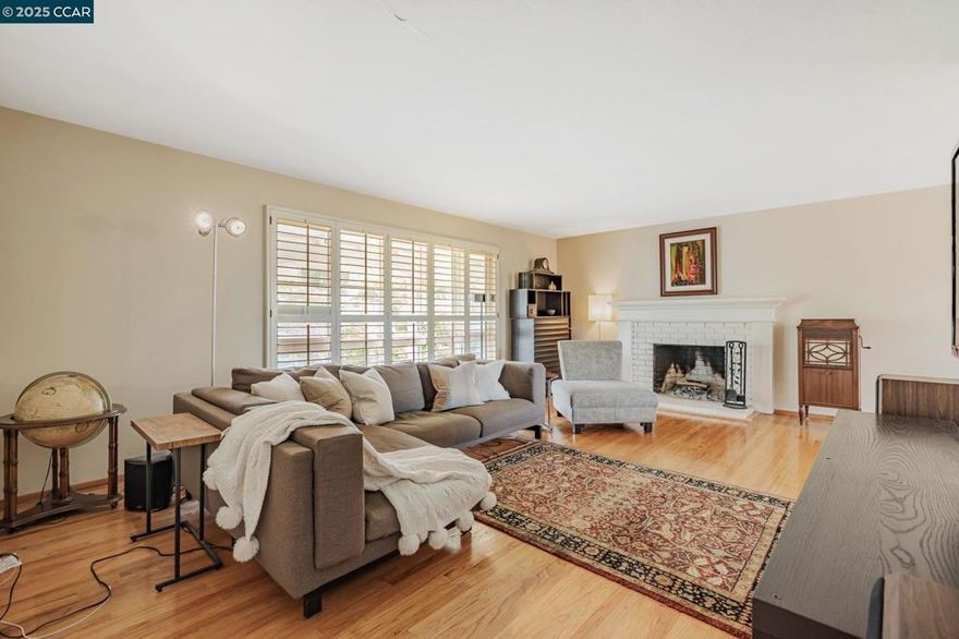 92 Gaywood Place, a charming single-level home located on a tranquil cul-de-sac. This 4-bedroom, 2-bathroom residence has 1,839 sqft of living space with a 19,200 sqft lot. Inside, you'll find hardwood floors, a formal living room with a fireplace, and a formal dining room. The heart of the home is the family/kitchen room combination, offering plenty of room to relax or entertain. Just off the family room, step out onto the newly repaired deck, perfect for enjoying your morning coffee or dining al fresco while soaking in the scenic views. For those who love to entertain, the private outdoor space features a large, updated pool deck, promising endless fun and relaxation. The property now boasts a new roof and is MOFD compliant, ensuring safety and peace of mind. The expansive yard offers ample room for gardening, play, or simply unwinding by your own pool. Wake up to a beautiful view in your primary suite, complete with a walk-in closet. Three additional well-sized bedrooms provide plenty of space, with a conveniently located laundry room and a large walk-in pantry inside the home. Separate room with a bathroom (not included in the sqft), can be used as an office or offers potential for an ADU. Just minutes away to top-rated Moraga Schools, including Elementary and Middle Schools.