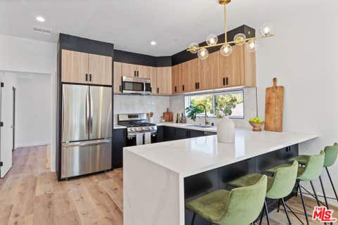 Photo of 10825 Hartsook Street, North Hollywood, CA 91601 (MLS # 26855033)