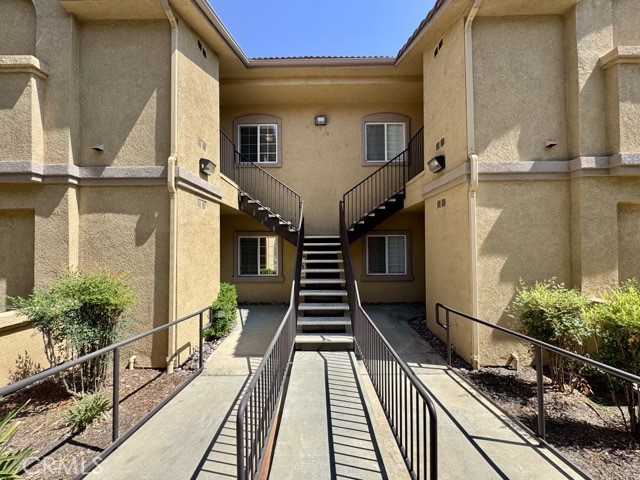 Welcome home to this beautifully upgraded condo in the desirable gated Madison Reserve Community of Murrieta. This second-level unit features 2 spacious bedrooms, each with a walk-in closet and 2 full bathrooms. You’ll enjoy newer oak flooring throughout, an updated kitchen, and a large primary suite with an upgraded ensuite bathroom. The washer and dryer are conveniently located inside, adjacent to the kitchen, along with additional storage cabinets. The secondary bedroom is generously sized, with another upgraded full bathroom just across the hall. Venture outside to your private patio, where you can relax in the shade of the surrounding trees and enjoy your morning coffee. The community offers wonderful amenities, including a park, pool, jacuzzi, clubhouse, gym and more. Schedule your showing today! *NO PETS WILL BE CONSIDERED*