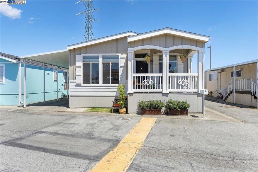 This large home has it all! Manufactured home in Harbor Village (all age and pet friendly community) features: 3 bedrooms; 2 full baths; open kitchen, dining, and living area with laminate flooring; kitchen with beautiful marble counters tops and upgraded stainless steal appliances, spacious island; living room with gas fireplace and built in shelves; primary suite includes, glamour bathroom with 2 sinks, stall shower, and soaking tub; coffered tray ceilings in living room and primary bedroom; hallway with built in book shelf; crown molding; long covered carport, custom large shed; private rear yard space and more! Don't let this one go by. Fireplaces: GAS,LIV,