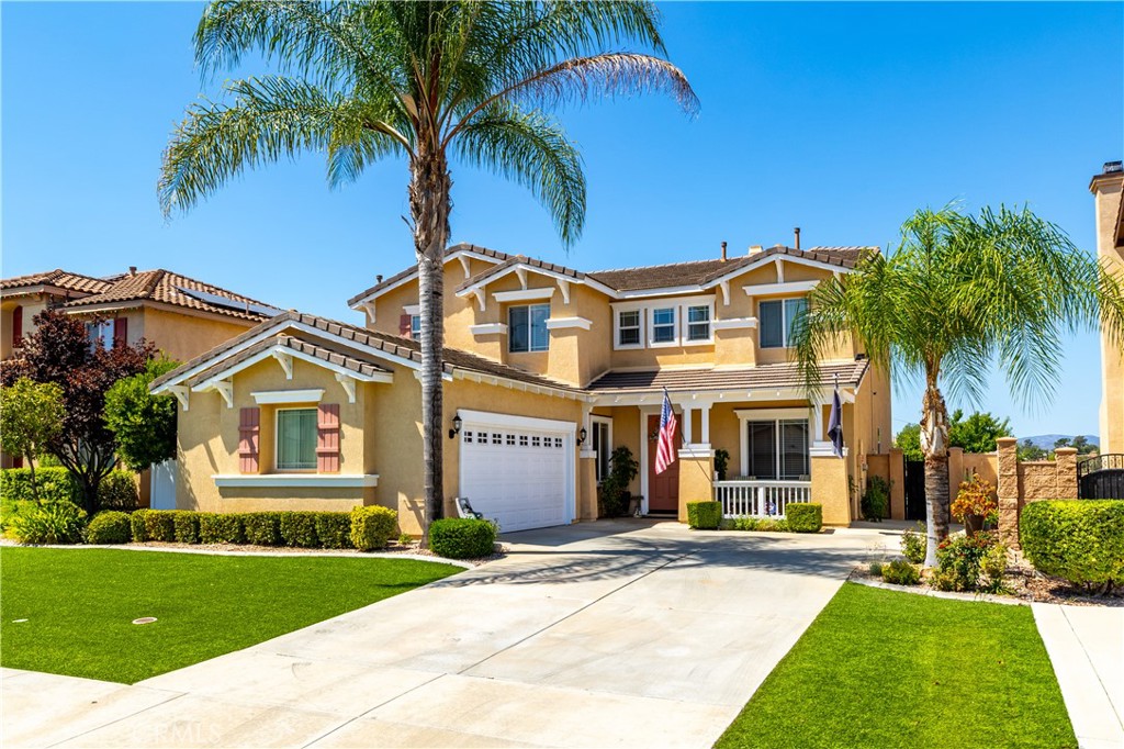 Welcome to your dream home! This beautifully maintained two-story home offers a comfort, versatility, and stunning outdoor living. The front yard features low-maintenance turf landscaping for year-round curb appeal. Step inside to discover a spacious layout that includes a welcoming living room, cozy family room, and an open concept kitchen perfect for gatherings. A convenient half bath an a generous den-ideal for a home office or easily converted into a fifth bedroom complete the main level. Upstairs you will find all bedrooms and all bathrooms thoughtfully arranged for privacy and functionality. The master suite is a true sanctuary, featuring a private retreat area, luxurious jacuzzi tub, double-sink vanity, shower and a walk-in closet. Step outside to a backyard oasis, beautifully landscaped with lush greenery and thriving citrus trees. Enjoy the mountain views from the shaded patio, complete with remote-controlled shade and stylish outdoor furnishings-perfect for relaxing or entertaining. This home blends indoor comfort with outdoor serenity, offering a lifestyle of ease and elegance. No HOA, low taxes, paid solar system and halo water system filtration. Don't miss your chance to own a home that is as beautiful inside as it is outside.