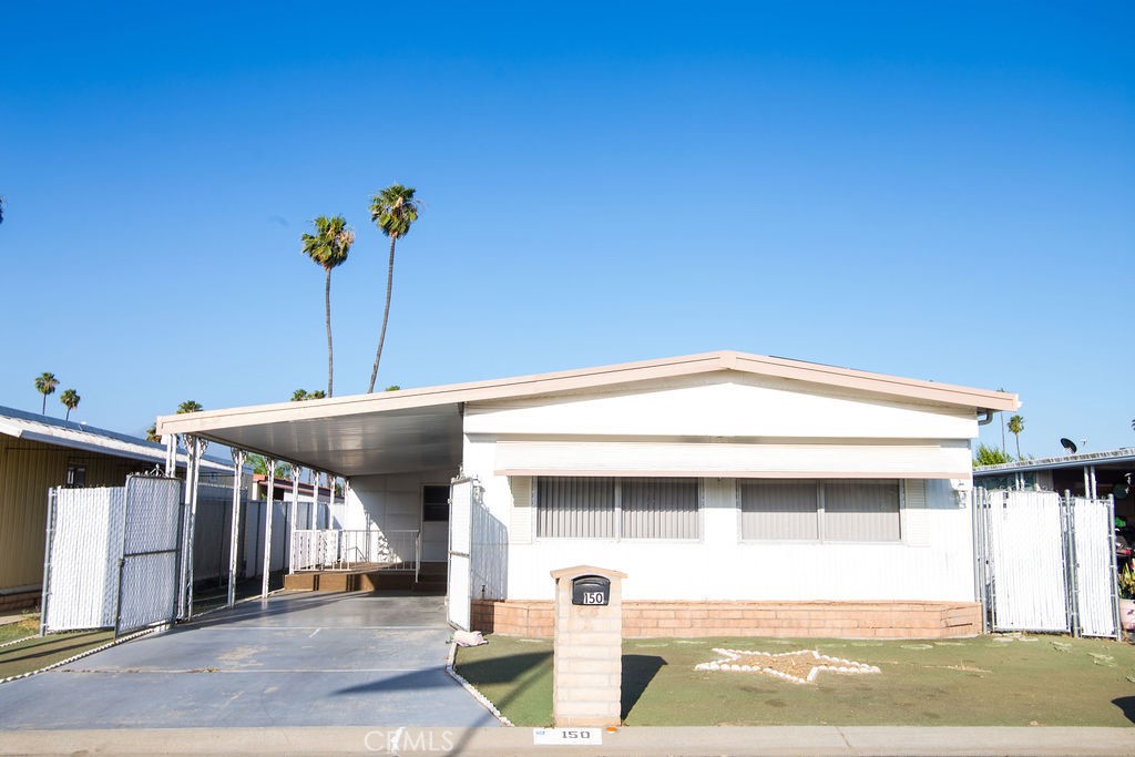 SENIOR MOBILE HOME WITH LAND, NO RENT ! 2 Bedroom, 2 Bathroom, central heating and air conditioning, walk-in closet. Recently remolded, new dishwasher, laminate flooring throughout, freshly painted with many upgrades. Located directly across from the clubhouse on a quiet street. Situated in the very affordable area of Sierra Dawn South 55+ Senior Community offering many amenities such as year-round heated pool and spa, billiard room, gym, crafts room, card room, meeting room, outdoor bbq, pickleball court, RV parking and much more. For Sierra Dawn rules call 951/925-6502, Seller Motivated. CALL TODAY