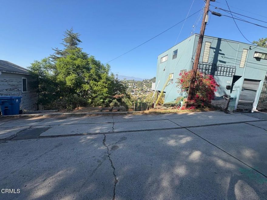 Discover an exceptional opportunity to own a magnificent view lot in one of LA's most vibrant and perfectly situated communities. This exceptional property offers breathtaking mountain and city lights views along a fully developed street with all infrastructure already in place. It's one of those truly special opportunities that doesn't come around often -- an ideal canvas to build your custom dream home and create your own slice of Los Angeles living. Whether you envision a modern architectural masterpiece or a tranquil hillside retreat, this lot offers endless potential and inspiring vistas. 1867 Burnell Dr. -- where dreams take shape and views never end.