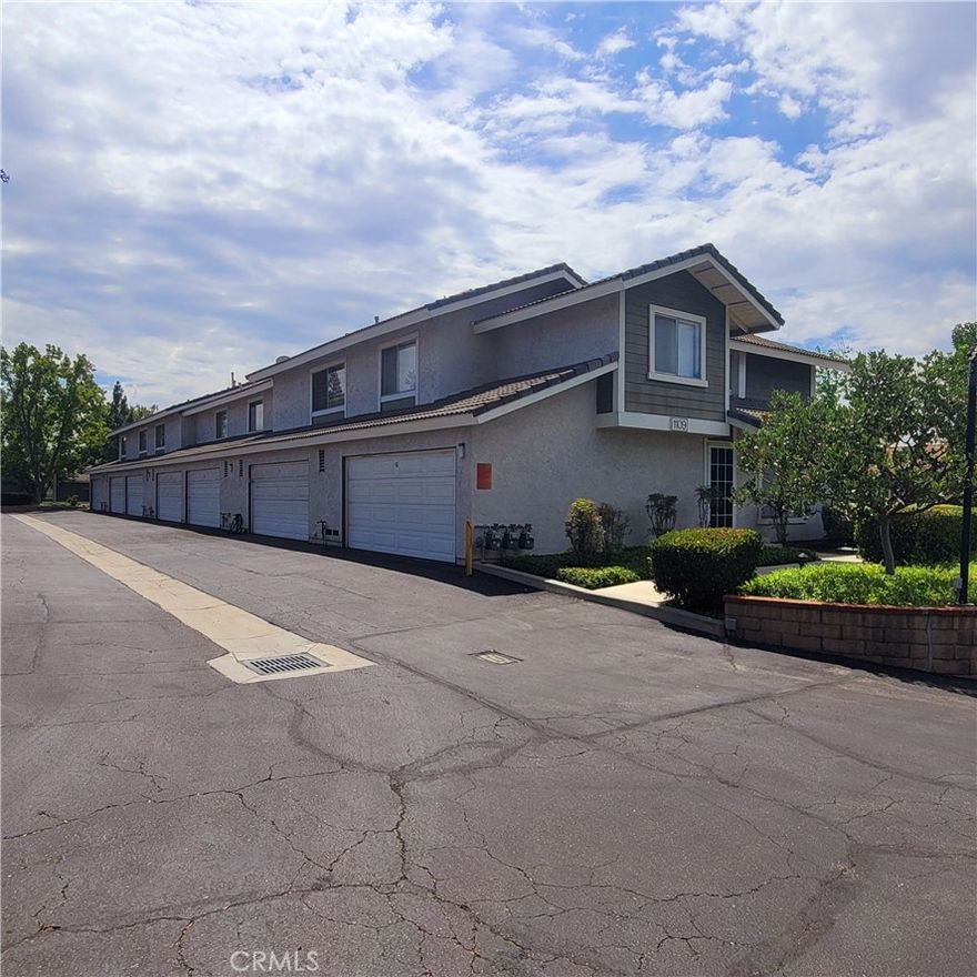 This gorgeous, turn-key townhouse is located in the beautiful, gated Sunset Crossing Community. This end unit has just one common wall and is situated in one of the best locations in the complex for both privacy and ease of access. It has been tastefully remodeled with all new interior paint, new laminate and porcelain tile flooring throughout, new kitchen cabinets with Quartz counter tops, new lighting fixtures, vertical blinds and so much more. It boasts 3 bedrooms and 3 recently renovated bathrooms with 1,262 square feet of living space. The attached two car garage provides direct access to the inside, plus laundry hook-ups and plenty of shelving. There is also a good sized private backyard patio perfect for relaxing outdoors. The association features a sparkling swimming pool, spa and clubhouse with BBQ grills and tables. The Sunset Crossing Community is centrally located just minutes to the 57, 60 and 10 freeways, Cal Poly Pomona, Mt San Antonio College as well as plenty of retail shopping and restaurants. Water and trash are included in monthly HOA dues.