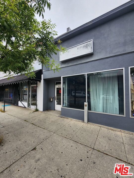 Located on one of the busiest corridors in Los Angeles, 1050 Fairfax Avenue offers unmatched visibility and steady foot traffic, making it an ideal space for a wide range of businesses, retail, wellness, creative offices, or professional services. Inside, the space features a versatile loft layout, creating an open and elevated feel perfect for both collaborative and client-facing use. Enjoy the ambiance of a skylight that brings in abundant natural light, built-in surround sound speakers for a professional audio experience, and custom curtains included for privacy and style. The property also comes equipped with internal security cameras, offering added peace of mind for business owners. This highly sought-after location sits at the heart of a vibrant neighborhood, surrounded by popular restaurants, boutique shops, and established commercial anchors. With constant exposure to both vehicular and pedestrian traffic, your business will benefit from built-in visibility and accessibility. Whether you're launching a new concept or expanding your brand presence, 1050 Fairfax Avenue delivers the energy, exposure, and functionality that successful businesses thrive on. Square footage is approximately 1,630. Making lease price approximately $2.30 per sq ft. Sized to be verified by lessee.