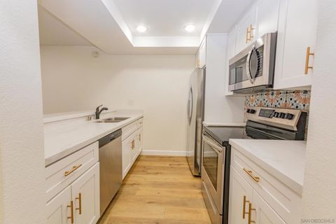 Photo of 10737 San Diego Mission Rd #115, San Diego, CA 92108 (MLS # 260011000SD)