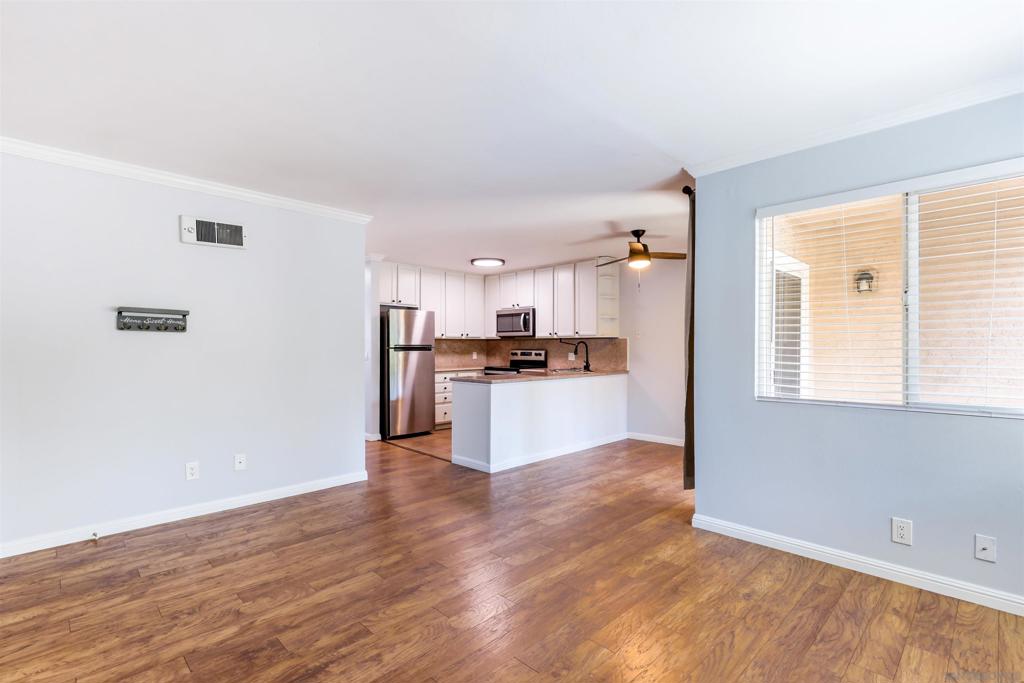 Freshly updated and move-in ready! This 2 bedroom, 1.5 bath upstairs corner condo offers a private feel with a spacious, open layout. The living and dining spaces flow easily together, making it great for everyday living or hosting friends. Both bedrooms are generously sized, with the primary bedroom connecting directly to the full bath. The home also has the option for an in-unit laundry hookup for added convenience, along with access to a community laundry room. Located in a well-kept complex with a pool, spa, and clubhouse, you’ll enjoy the best of both comfort and community. With its central location near shopping, dining, schools, and freeway access, this condo makes an excellent choice for first-time buyers, downsizers, or investors looking for a solid rental opportunity.