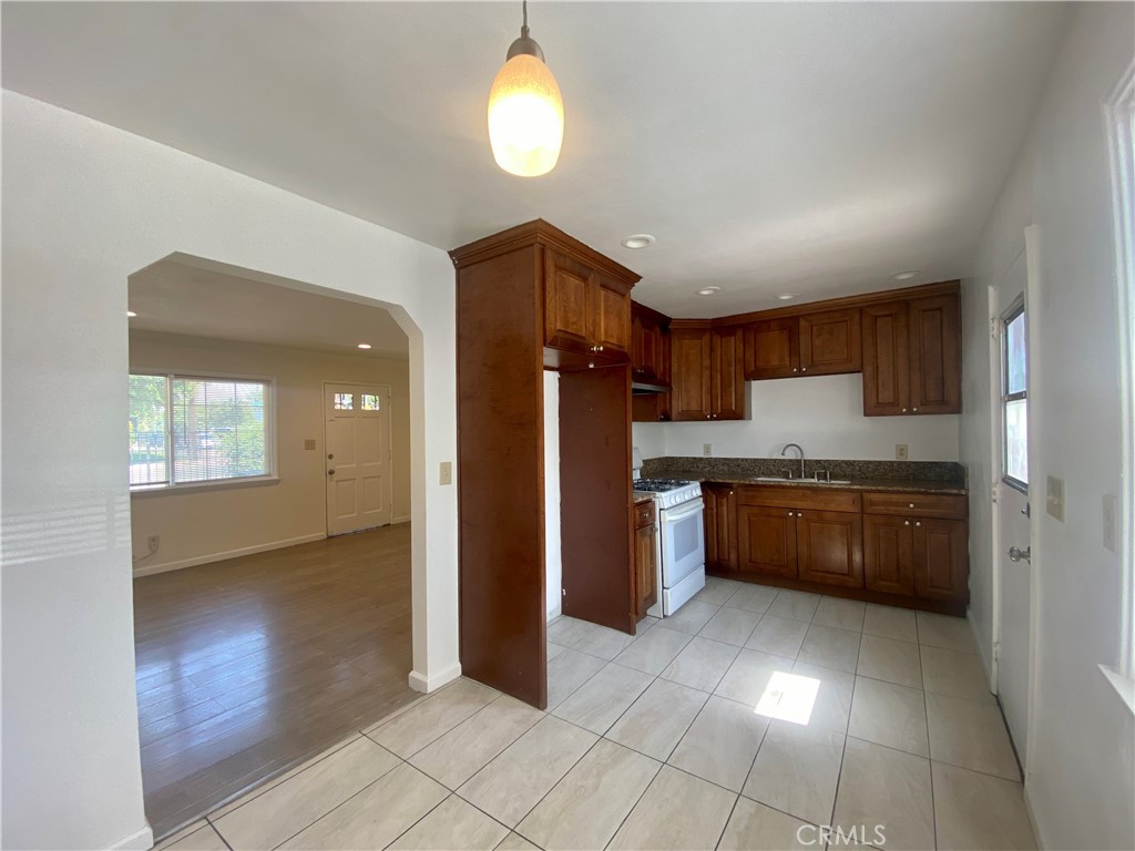 * UNIT #4 – * DOWNSTAIRS UNIT * Charming unit with lots of space… * Entry to living room and kitchen adjacent with cute breakfast/dining area * One bedroom is very spacious * Full sized range in kitchen * Vinyl plank flooring throughout * Unit has a great amount of natural light. Lots of unassigned parking in apartment complex. * Included in rent: Water and Trash. * Laundry: Community * Pet Policy: No Pets * Rent: $1,650 / Security Deposit: $1,650 / $45 per Adult Processing Fee – Cashier’s Check or Money Order only for Application Fee, Security Deposit and Processing Fee. NO smoking/vaping. One application per person living in property 18 and over. We require all original applications be delivered to our offices by prospective tenant. All tenants must carry renters insurance for the totality of their lease. Please be sure to read our entire application. Square footage and lot sizes are estimated. Minimum one year lease.