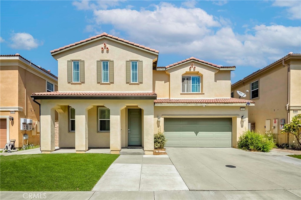 Welcome to the gated community of Laurel Gate! This beautiful single-family home features hardwood floors on the main level and a bright, open kitchen with granite countertops and stainless steel appliances overlooking the family room. The floor plan offers a convenient downstairs bedroom and full bath, plus three additional bedrooms upstairs. The spacious primary suite includes a luxurious bath with dual sinks, a separate shower, a soaking tub, and a walk-in closet. Upgrades include all bathrooms remodeled with quartz countertops in 2019, SPC waterproof flooring installed upstairs (including the stairs) in 2019, plantation shutters added in 2017, and artificial turf in the front yard along with backyard cement work completed in 2022. The home is also energy-efficient with 12 fully paid-off solar panels (4.23 kWp each). Community amenities include a pool, spa, and recreation area. Move-in ready with style, comfort, and efficiency in a desirable gated neighborhood!