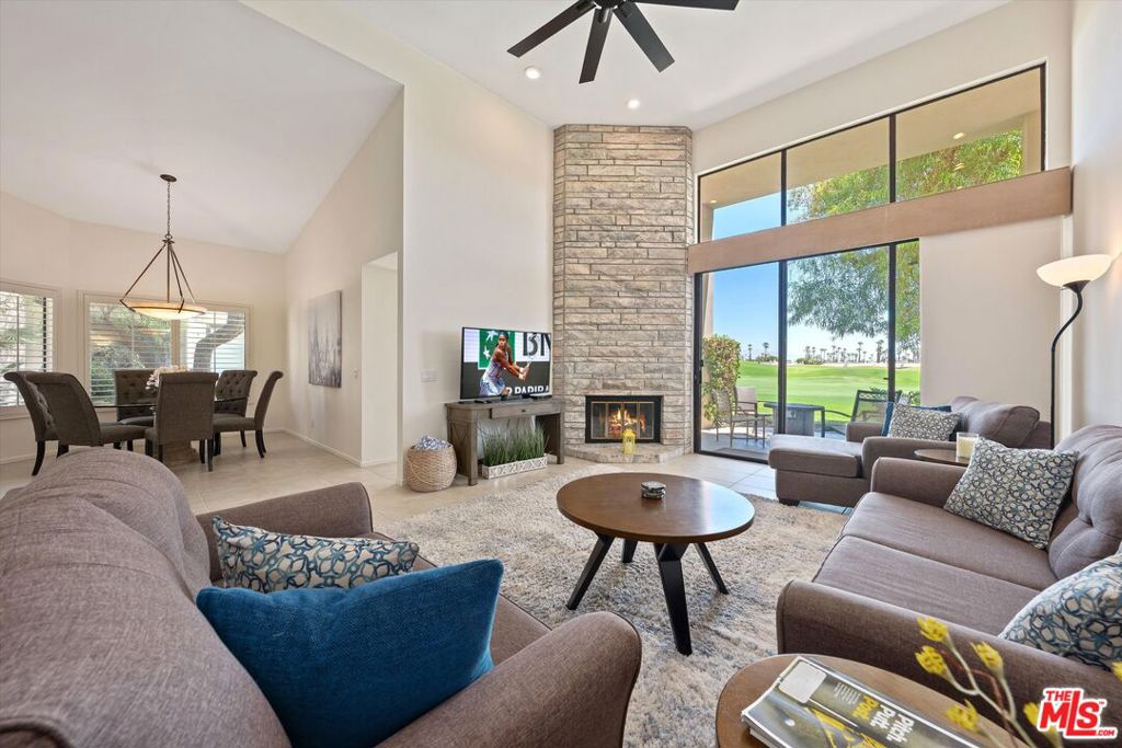 SEASONAL RENTAL Available November 2025 December 2025 until January 11, 2026. This tasteful, fully furnished retreat at PGA West, where this updated Champion 4 plan offers an unparalleled blend of elegance and comfort. Boasting 3BD and 3BA spread over 1,918 sqft, the residence showcases breathtaking fairway views of the #11 Stadium golf course, providing a picturesque backdrop for everyday living. Step inside to discover a tastefully appointed interior featuring tile flooring, custom paint, built-in closets, shutters, and soaring ceilings that enhance the spaciousness of each room. The kitchen is adorned with granite countertops, complementing modern appliances and creating a perfect setting for culinary endeavors. In the living room, a stone floor-to-ceiling fireplace adds warmth and character, while a convenient wet bar invites gatherings and entertainment. The master suite offers a serene escape with its own private patio, ideal for enjoying morning coffee or evening sunsets in tranquility. Located close by, the community pool and spa offer relaxation and leisure, completing the resort-style living experience. Community pool and spa are just steps away.