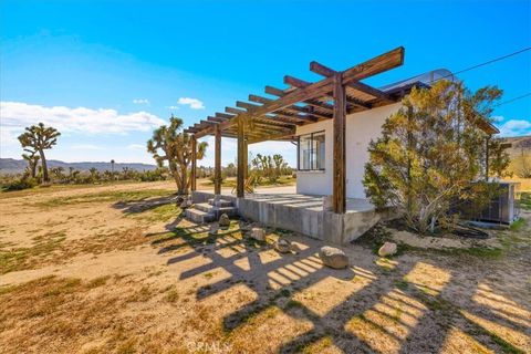 Photo of 5437 Paradise View Road, Yucca Valley, CA 92284 (MLS # JT26105386)