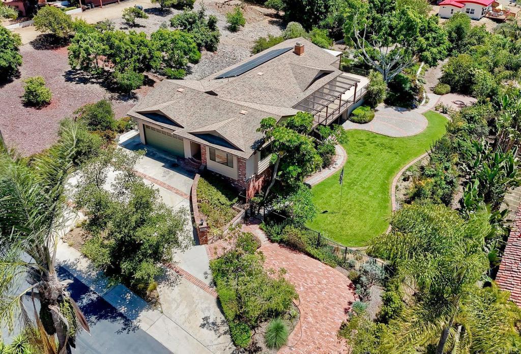 Welcome to 338 Skyline Dr. This is a Custom Executive, mostly single level living, all electric home with Solar Power. This exquisite Ranch style Estate nestled in an exclusive private neighborhood of large lots, cool ocean breezes, & horizon views of the Pacific Ocean. There are 2932 sq ft of interior living space with a huge balcony/deck & a new pergola. The huge view balcony is perfect for entertaining or quiet reflection. The meticulously landscaped .63 acre lot designed by a renowned landscape architect & contractor features a captivating fire pit and a unique walkout bonus room, seamlessly merging indoor & outdoor living for an entertainer's paradise. On the main level, step inside to discover a stunning great room with high vaulted wood & beamed ceilings, creating an airy, grand atmosphere bathed in natural light. Two large brick fireplaces serve a s striking focal points, adding warmth & sophistication to the living spaces. The home offers 3 spacious bedrooms, two pristine bathrooms, and a versatile den, ideal for home office or tranquil retreat. this rare Vista masterpiece, combining iconic Ranch style single-level living, coastal charm, and the privacy of a custom home neighborhood is a must see. Schedule your private tour today to experience this extraordinary property.Here is perspective with the concept of "Location, Location, Location" in mind:Vista 92084 in the opinion of many selling real estate in San Diego County, 92084 is the most under-valued & under-rated zip code in San Diego County. During Summer months, 92084 is often 10 degrees cooler than nearby Escondido or Fallbrook due to the closer proximity to the coast, an unobstructed westerly prevailing winds from the ocean. The climate in 92084 Vista is known worldwide for its ideal weather for growing flowers, fruits & vegetables. I have personally seen papayas, mangoes & pineapple growing in this zip code. This property has flowering & fragrant Plumerias & Dragon Fruit growing, as well as a variety of fruit bearing Citrus trees among the gorgeous ,mostly flat back & side yard landscaping.The location is also great for its access to nearby major health care facilities, such as Kaiser, Scripps, and Tri City Hospitals, each of which are along the Hwy 78 corridor. There are also the higher education campuses of Cal State San Marcos, Palomar College & Mira Costa College. Shopping and restaurants are also prolific from Carlsbad to Escondido.