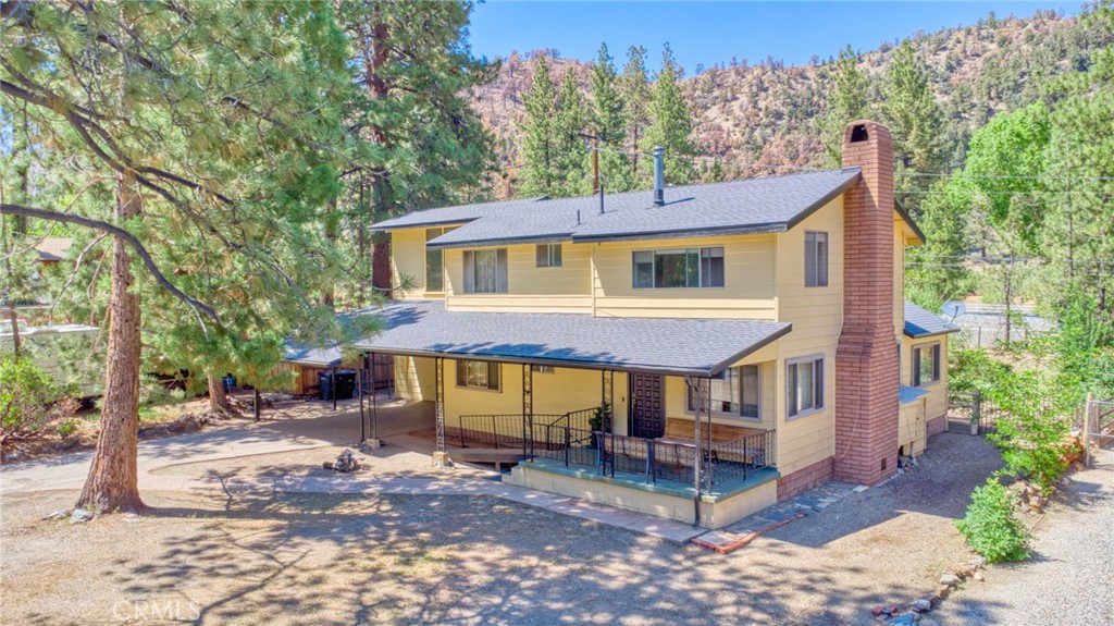 Charming 3-Bedroom Wrightwood Home with Bonus Area – Walk to Town!
Welcome to this beautiful 3-bedroom, 2-bathroom home nestled in the heart of Wrightwood! Just a short stroll from local shops and restaurants and only 10 minutes from Mountain High Ski Resort, this home blends cozy mountain charm with everyday convenience.
Inside, you’ll find a spacious layout featuring a large living room with a wood-burning fireplace, a cozy master suite with its own fireplace, and a bonus area that offers endless flexibility. With its own private entrance, the bonus space could easily serve as a 4th bedroom, office, art studio, or even be converted into a separate living area for guests or rental income.
Key Features:
3 Bedrooms + Bonus Area (with private entrance – perfect for separate living space, studio, or guest suite)
2 Full Bathrooms
3 Wood-Burning Fireplaces – Located in the living room, master bedroom, and garage (pot belly stove)
2-Car Attached Garage
RV Parking with RV Dump Hookup
New Roof, Fresh Paint, and New Rain Gutters
Electric Water Heaters (replaced ~3 years ago)
Water Softener System
Newer Septic Tank (replaced within the last 5 years)
2 Storage Sheds in the backyard
No Rear Neighbor – Enjoy privacy and open skies!
Situated on a generous lot with mature trees and mountain ambiance, this home offers the perfect blend of seclusion and accessibility. Whether you're looking for a full-time residence, a weekend getaway, or a potential income property, this Wrightwood gem checks all the boxes.
Don’t miss your chance to own this move-in-ready mountain retreat – schedule your showing today!
