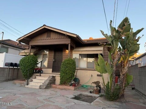 Photo of 10220 McClemont Avenue, Los Angeles, CA 91042 (MLS # P1-28943)