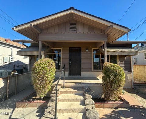 Photo of 10220 McClemont Avenue, Los Angeles, CA 91042 (MLS # P1-28943)