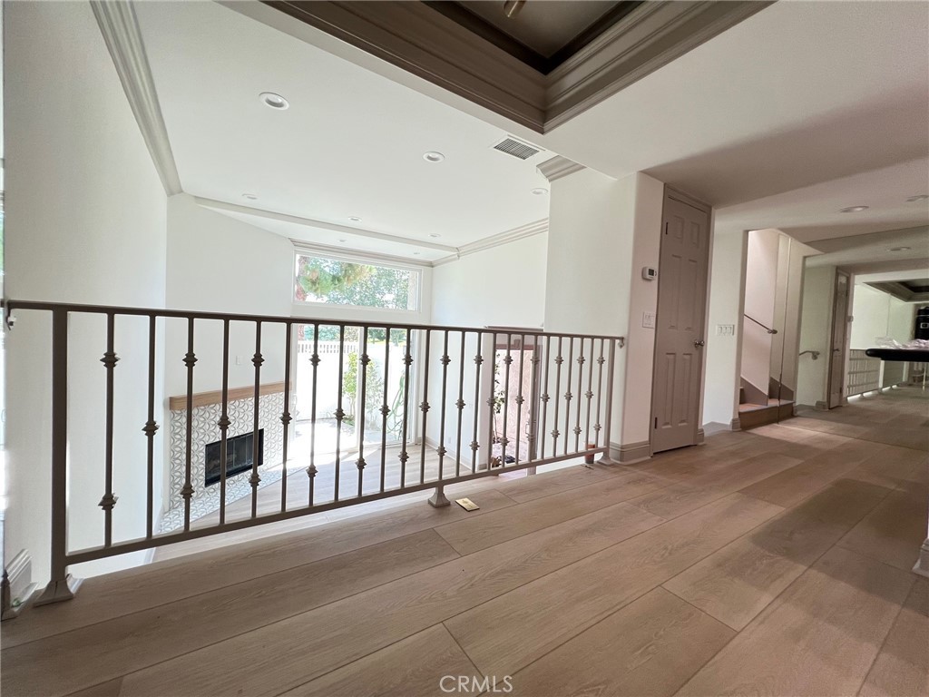 NEWLY REMODELED TOWNHOME, best location all the way in the back of this small peaceful complex. Unit faces Wilson Park with park views from: primary suite (with balcony), kitchen, and dining room. Quiet, serene, 3 BEDROOM, 3 FULL BATHS, 2 ENSUITE BEDROOMS, WALK IN CLOSETS, OVERSIZED 2 CAR ATTACHED GARAGE, central air, 220V IN GARAGE FOR ELECTRIC VEHICLE CHARGING. Stainless steal appliances, gas range. Key access to private gated entrance to Wilson Park right outside your front door!! Refrigerator, Washer and Dryer included
Hardwood floors, fireplace in living room. Landscaped yard with vinyl fencing and automatic sprinkler system. Community pool, centrally located, close to: the beach, freeways, John Wayne Airport, South Coast Plaza, OC Fair Grounds and all of the entertainment and dining that Costa Mesa, Newport Beach and Huntington Beach have to offer.