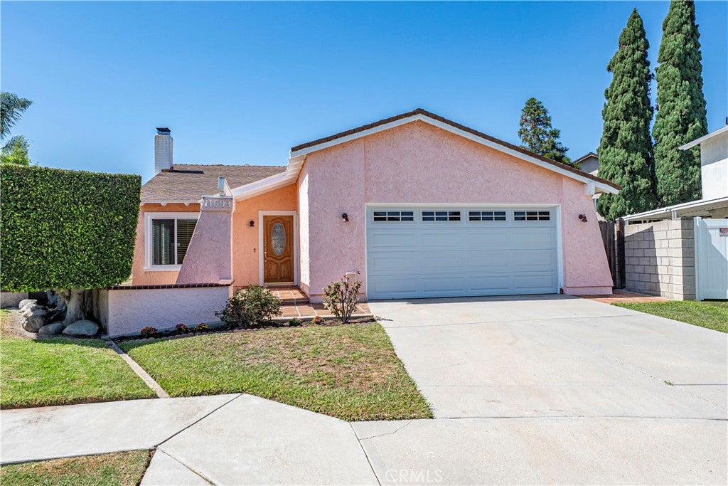 Photo of 11693 Guam Circle CIR, Cypress, CA 90630 (MLS # PW26214274)
