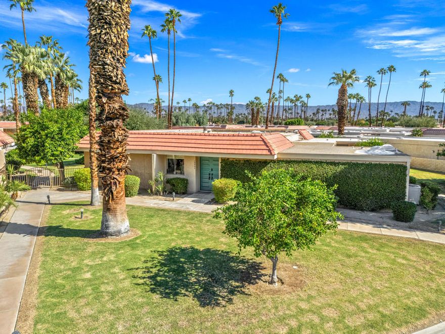 Mid-Century modern furnished Condo built in 1967 designed by legendary architect William Krisel who helped define famous Palm Springs modern architecture. This Indian Wells Country Club Sandpiper Condo has fantastic location, 2 bedrooms, 2 bath, large atrium patio, 2 car garage and 1864 Sq. Ft. of interior living with extended patio overlooking the beautiful pool and mountain views. Walk into light and bright open floor plan with high ceilings, wall of glass sliders in the spacious Great Room, high ceilings, stone fireplace, and built-in custom cabinetry galore. Formal Dining area with views. Kitchen has picturesque south mountain views, light countertops, white appliances, informal wet bar, and seating. Light tile floors throughout; carpets in the bedrooms. Primary Bedroom with walk-out private atrium and mountain views. Primary Bath has light countertops, dual sinks, big walk-in closet, large vanity, and separate toilet area with tub/shower. Guest Bedroom has walk- in closet, and ensuite bath with white tiled shower. Large Laundry Room for extra storage. Enjoy the privacy of Indian Wells Country Club!