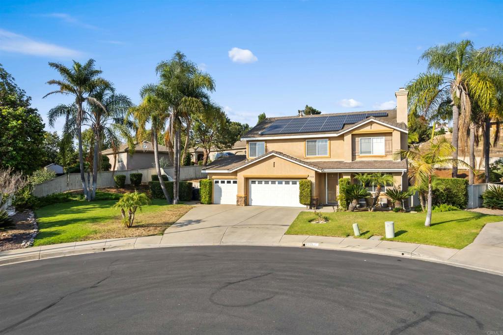 Welcome to 1312 Summer Ct, a stunning 4-bedroom, 3-bath home that perfectly blends luxury and comfort. This spacious former model home is designed for those who appreciate quality and elegance. Nestled on a large lot at the end of a quiet cul-de-sac, this property offers a private oasis enhanced by tropical landscaping. The centerpiece of the backyard is a beautiful saltwater freeform pool with built-in spa, peddle tech finish, firepit, and plumed for solar heating—perfect for year-round enjoyment. Inside, the home features exquisite crown molding throughout and recessed lighting that adds to the sophisticated ambiance. The master suite is truly a retreat with vaulted ceilings, a huge bedroom, and a double-entrance, walk-in closet. The en-suite bathroom features a double-sided vanity, providing ample space for morning routines. Enjoy cozy evenings by one of the two gas fireplaces, or entertain friends with the built-in surround sound system on both floors. The brand-new AC condenser ensures comfort in all seasons, while the efficient solar system offers energy savings. The dog run with turf provides a convenient space for pet lovers. The large side yard and private backyard offer plenty of outdoor space for activities and relaxation. With its superior craftsmanship, thoughtful design, and prime location, 1312 Summer Ct. is more than a home—it’s a lifestyle.