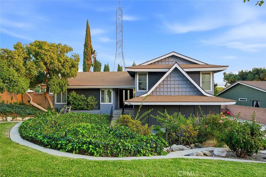 A beautifully upgraded split level home in the highly desirable Old San Dimas neighborhood. Just minutes from San Dimas Golf Course and San Dimas Canyon Regional Community Park, this move-in-ready property combines comfort, style, and location in a truly special foothill setting.
With 5 bedrooms, 2 baths, and 2,124 sq ft of living space on a generous 9,813 sq ft lot, this home offers both room to spread out and space to grow. The open-concept layout is light, bright, and perfect for modern living. Fresh interior and exterior paint, recessed lighting, and new flooring throughout create a crisp, updated feel from the moment you step inside.
The remodeled kitchen is the heart of the home—featuring quartz countertops, custom cabinetry, stainless steel appliances, and modern finishes that blend beauty and function. Both bathrooms have been elegantly updated with new vanities, fully tiled showers, and contemporary fixtures, giving the space a fresh, spa-like ambience.
A spacious living room with recessed lighting and large windows opens to the dining area and backyard—making this home ideal for entertaining or quiet evenings in. The five bedrooms offer flexibility for guests, a home office, or multigenerational living. The primary suite includes ample closet space and a private bathroom with clean, modern lines.
Out back, the yard offers mature fruit trees and plenty of usable space and shaded areas perfect for outdoor dining, open green space for play, and an inviting pool framed by tall privacy hedges. It’s the ideal setup for entertaining, relaxing, or simply enjoying the quiet rhythm of Old San Dimas living. An attached garage and wide driveway provide plenty of parking and storage.
Living in Old San Dimas means you’re minutes from the area’s most beloved amenities: San Dimas Canyon Golf Course, San Dimas Canyon Nature Center, and Bonelli Regional Park for hiking, boating, and outdoor adventures. You’re also close to top-rated schools, local shops, restaurants, and freeway access for an easy commute to Los Angeles, Pasadena, or Orange County.
Whether you’re a growing family, a buyer looking for opportunities to add an ADU, or an investor seeking a turn-key property in a stable market, this home delivers on every front. With its combination of modern updates, a spacious lot, and prime location at the base of the San Gabriel Mountains, this home offers the perfect balance of comfort and California lifestyle.