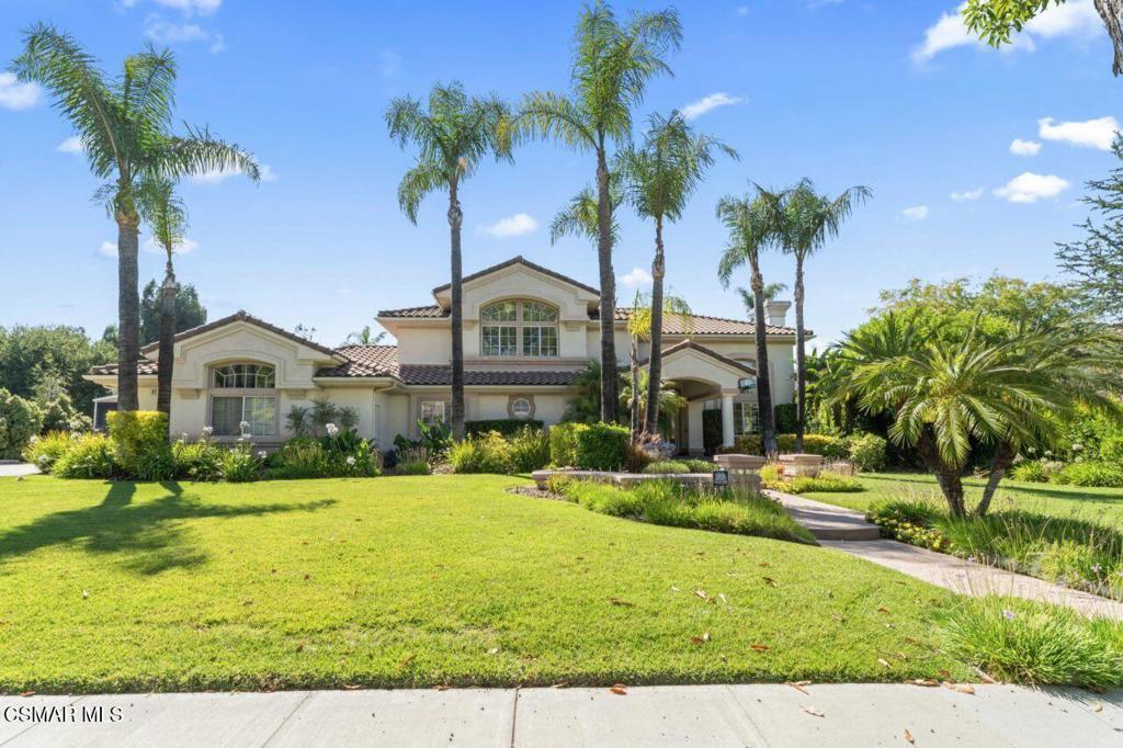 Welcome to 64 Highland, a private luxury retreat nestled at the end of a quiet cul-de-sac in one of Simi Valley's most sought-after neighborhoods. This exceptional two-story estate offers over 3,900 square feet of elegant living space on an expansive 31,363 square foot lot. With 5 spacious bedrooms and 3.5 bathrooms, this custom home blends sophisticated design with resort-style amenities. As you arrive, you're greeted by lush landscaping and a grand 4-car garage with gated, wide RV access perfect for a motorhome, boat, or future ADU. The backyard is a true entertainer's paradise, boasting a spectacular infinity pool with custom rock features, a thrilling waterslide, tranquil waterfall, oversized spa. A built-in BBQ and bar area complete the ultimate outdoor living experience, all framed by scenic open space for maximum privacy. Inside, the home features a dramatic entry with vaulted ceilings, refined finishes, and beautiful natural light. The chef's kitchen opens seamlessly to the inviting family room and built-in bar area, creating the ideal space for gatherings and celebrations. The luxurious primary suite includes a romantic gas fireplace, spa-inspired bathroom with soaking tub, dual vanities, and a large walk-in closet built for organization and style. Located in a tranquil cul-de-sac with no HOA and backing to open space, this residence offers rare privacy, versatility, and prestige. Don't miss the opportunity to own one of Simi Valley's most exclusive homes schedule your private showing today and experience resort-style living at its finest.