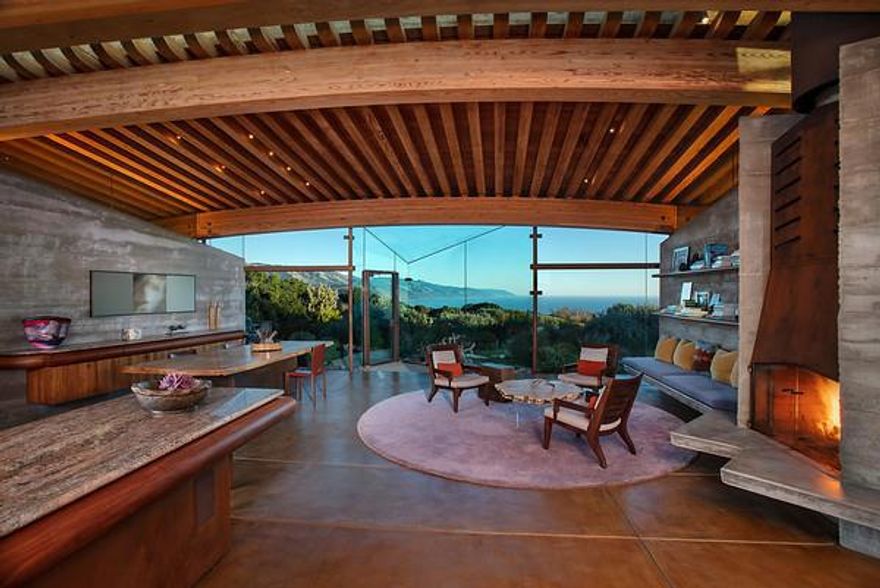 This 100+ acre nature preserve with white sand beach, redwood forest, and 360 degree views is where Big Sur architect Mickey Muennig chose to design his final residential masterpiece. Set within Deer Ridge by way of a sod roof that also provides insulation, Muennig created this luxurious off grid residence on a site with views all the way to San Luis Obispo and Santa Cruz counties. Radiant heat warms the huge concrete foundation which supports the massive north and south facing glass walls that bring the outside in. Exquisite wood craftmanship defines the 3 bdrms and 3 baths in the main house and the detached guest house which provide the base from which to explore the property's micro-climates, habitats, seasonal streams, miles of trails, and white sand beach that may only be reached from this property, or the sea. Just above the un-named beach, a potential building site sits within a natural amphitheater of land which just may be the most private oceanfront site on the entire coast.