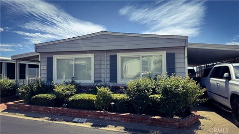 Photo of 10210 Baseline Road #212, Alta Loma, CA 91701 (MLS # IV26203713)