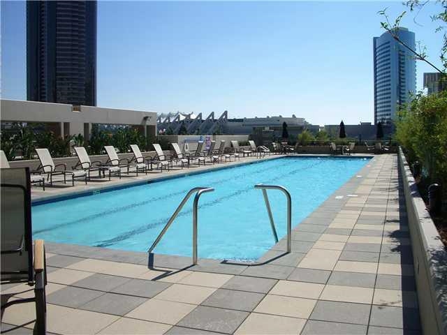 Imagine, viewing the bay, Coronado bridge by day and dazzling city lights by night. Add to this perfect picture an ideal open floor plan which includes, 2 separated bedroom suites PLUS a den/office. All of this in one of the most desirable Downtown developments. With easy access to waterfront, restaurants and shopping. A full service building with concierge, security, pool, recreation room, guest suite and media theater. An excellent combination of style, quality and location. Neighborhoods: Marina District