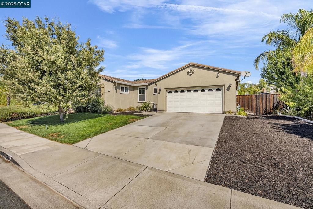 WHY CHOOSE THIS PROPERTY? Discover the perfect blend of comfort, convenience, & savings with this stunning home! Desirable SINGLE-STORY layout w/ a HUGE, FLAT YARD that's designed for relaxation, entertaintment. SIGNIFICANT SAVINGS- Benefit from lower property tax, NO monthly HOA dues*Notice PRIVATE Entry (mini gate/security)*Impressive Kitchen Features*Primary Suite is SPACIOUS & QUIET (away from secondary bedrooms)*Equipped w/ SOLAR Power & Back-up Battery*Stunning Low-Maintenance Laminated Floors *Exceptional Outdoor Space*The Expansive FLAT YARD is a rare find, offering potential RV parking, space for a basketball court, a play area for kids, and even room for a possible pool/spa or outdoor kitchen*Grow your own ORGANIC produce! Delight in fresh organic vegetables & fruits right from your yard, including avocados, dragon fruit, apples, lemon, persimmons, nectarines, pomelos, grapefruits, lime. *Near shops, schools, parks, approx 5-minute away from BART extension*FREE refrigerator, washer, dryer, patio canopy, kid's cubby house w/ a slide. HURRY, DON'T MISS THIS ONE! Don't miss this opportunity to make this move-in ready home your own—schedule your private tour today!