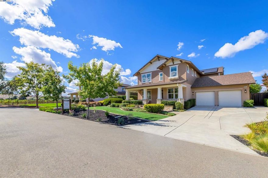 LOCATION, LOCATION, LOCATION! Don't miss this rare property with UNOBSTRUCTED 360° VINEYARD VIEWS. From the moment you step through the front door you’re greeted by sweeping panoramas of Livermore’s iconic wine country. This tech forward home features OWNED ELECTRIC solar with 2 Tesla Power walls, OWNED POOL SOLAR, and wi-fi enabled controls to irrigation, HVAC and security systems. The backyard is a private resort oasis, showcasing a lagoon-style pool & spa, and full outdoor kitchen complete with built-in BBQ, pizza oven, refrigerator, sink and large bar. You can sit back and relax under the motorized pergola and enjoy outdoor living at its finest with a fully permitted backyard bathroom, temp. controlled bonus room, and 498 sq ft of covered patio's. You will not want to miss the chef inspired kitchen with Wolf range, pot filler, wine fridge and oversized island with leathered finish. Functional floor plan with 1 BED & BATH DOWNSTAIRS, upstairs laundry, office area and oversized open loft or 5th bedroom. Retreat to primary suite with expansive built-in closet cabinets and stunning views of vineyards and hills!! Garage is fully finished with epoxy floors, and abundant storage racks and tool cabinet. DO NOT MISS THIS ONE OF A KIND ONE OWNER HOME!!!