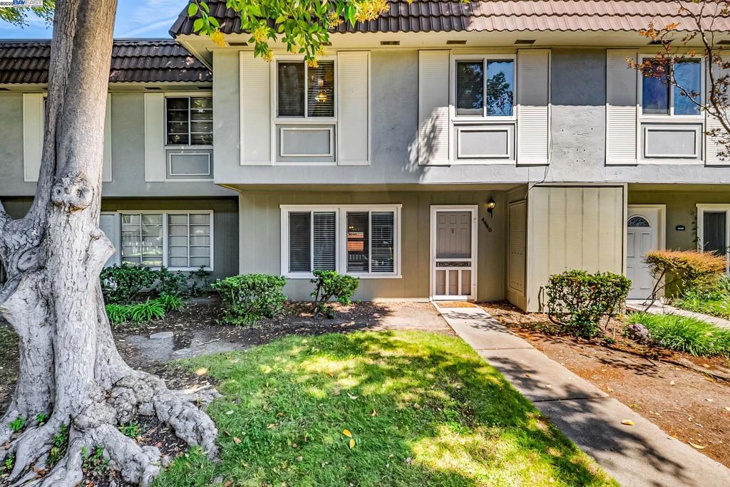Desirable Las Positas Gardens neighborhood, this rare 4-bedroom, 2.5-bath townhome offers approximately 1,474 sq ft of thoughtfully designed living space. Enjoy an open, light-filled floor plan featuring spacious living and dining areas, an updated kitchen with white cabinetry, sleek quartz countertops, and abundant storage. The expansive primary suite includes a private ensuite bath, complemented by three additional generously sized bedrooms and a full bath upstairs. Further highlights include an indoor laundry room conveniently located off the kitchen, a stylish half bath, laminate flooring, ceiling fans, and a whole house HEPA filter with electrostatic system for enhanced air quality. Step outside to your private patio with a storage area, leading directly to covered parking for two vehicles. Ideally situated near BART, shopping, the 580/680 freeways, award-winning schools, Iron Horse Trail, and historic downtown Pleasanton. This home offers both comfort and convenience in one of the area's most sought-after locations!