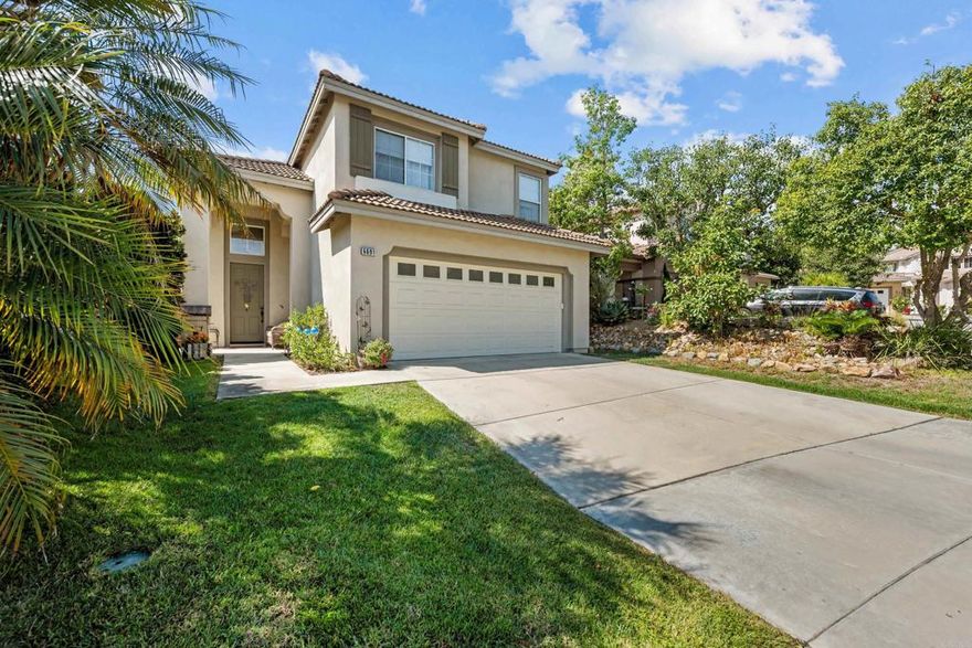 Come home to Carlsbad! This 3 bed 2.5 bath boasts over 2,000 square feet of space with a park like back yard for true California living. The grand vaulted ceilings when you walk into the formal living and dining room have a pass through view to the custom covered patio and terraced landscaped backyard. (Currently configured to seat 25 people with plenty of room for lawn games, pizza making and BBQing, and adding even more seating if wanted!) The newly updated eat in kitchen is open to the cozy family room with gas log fireplace for cuddled up movie nights. OWNED solar keeps your electric bill ultra low with an annual true up less than the cost of a single month without it. New energy efficient windows with lifetime transferable warranties in all bedrooms and on the west side of the house add even more value. Upstairs you'll find a spacious master bedroom and ensuite with separate shower and deep soaking tub and walk in closet.  An open light filled loft awaits your vision and two extra bedrooms with a full bath complete the upstairs. Ceiling fans adorn all bedrooms and the family room. Meadowood is a friendly neighborhood with a beautiful community pool and clubhouse and four pocket parks that is waiting to welcome you! Fantastic La Costa Meadows elementary and San Elijo Middle school and the brand new SMHS with nationally recognized programs are your assigned district here. Make your offer in time to be home for the holidays at 6691 Corte Eduardo Carlsbad, CA!